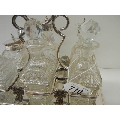 710 - A good silver plate 6 bottle cruet.