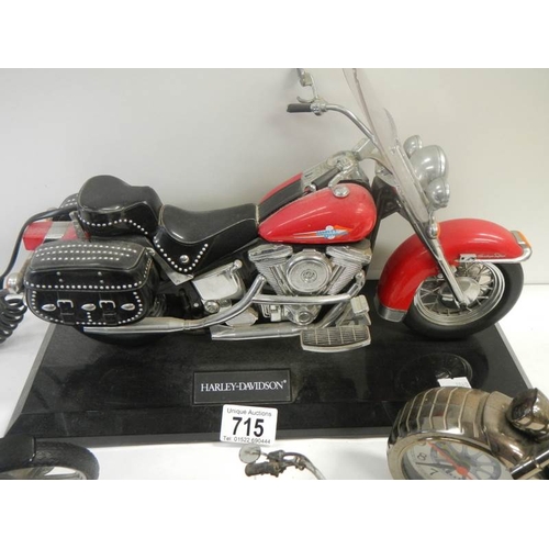 715 - 4 good model motor cycles including Harley Davidson.