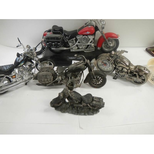 715 - 4 good model motor cycles including Harley Davidson.