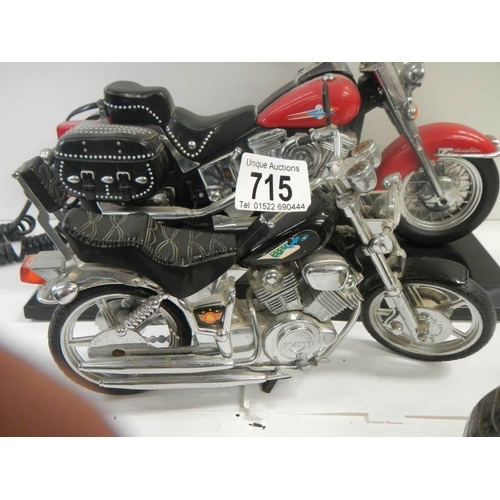 715 - 4 good model motor cycles including Harley Davidson.