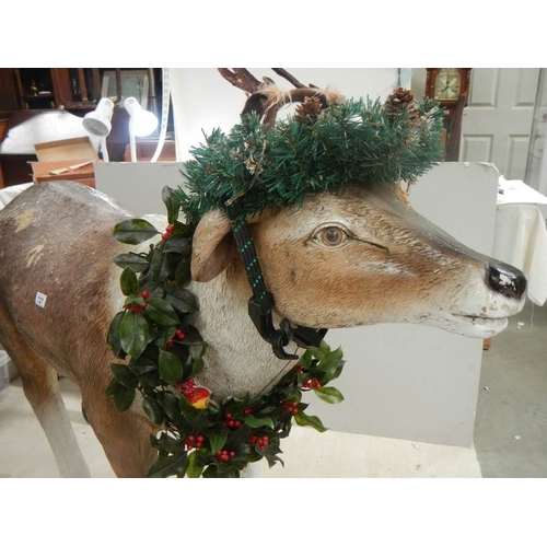 727 - A full size model of a reindeer, 36'' tall x 60'' long (crack to back leg).