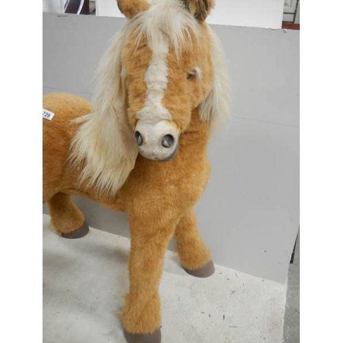 729 - A battery operated pony,  36'' tall.