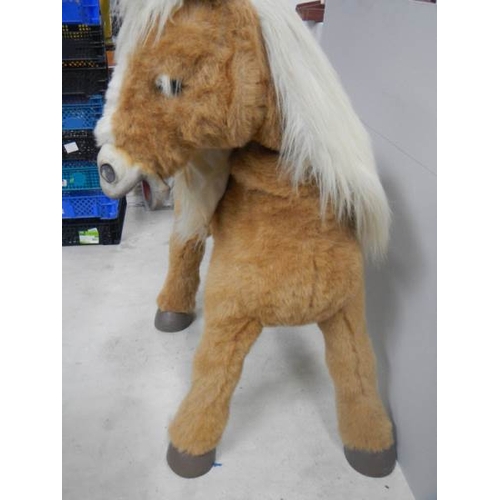 729 - A battery operated pony,  36'' tall.