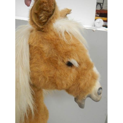 729 - A battery operated pony,  36'' tall.