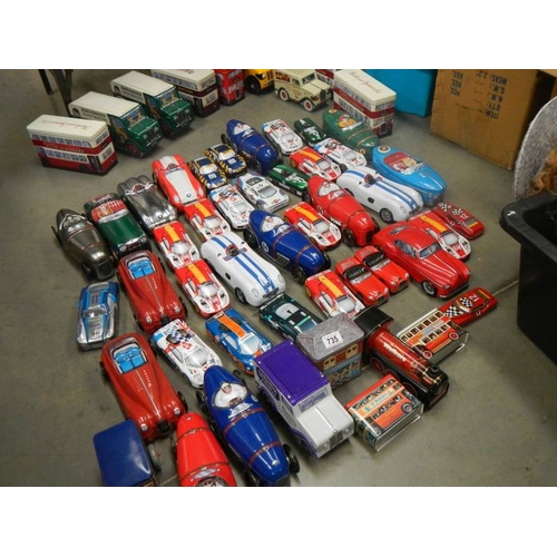 735 - 2 boxes of biscuit and sweet vehicle tins including buses and cars.