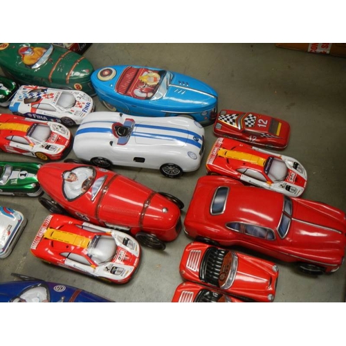 735 - 2 boxes of biscuit and sweet vehicle tins including buses and cars.