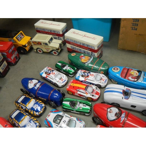 735 - 2 boxes of biscuit and sweet vehicle tins including buses and cars.