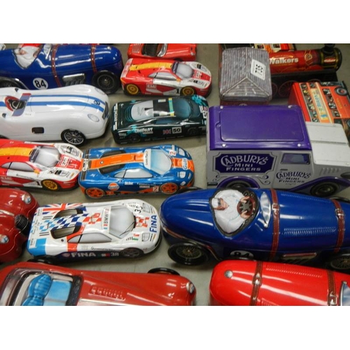 735 - 2 boxes of biscuit and sweet vehicle tins including buses and cars.