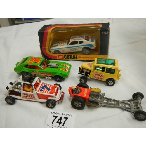 747 - A box containing Corgi 163 custom car and other models.