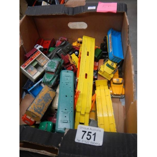 751 - A box containing various die cat models including Lesney, Matchbox, Corgi and Dinky.