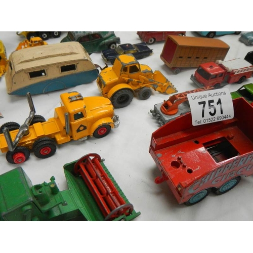 751 - A box containing various die cat models including Lesney, Matchbox, Corgi and Dinky.