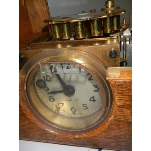 756 - A mid 20th century oak cased pigeon clock.