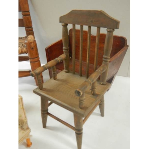 763 - A mixed lot of Victorian and later dolls furniture including chair, monks bench, Windsor style chair... 