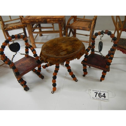 764 - A mixed lot of old bamboo and other traveller sample furniture, approximately 14 items.