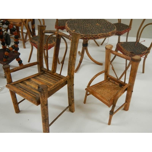 764 - A mixed lot of old bamboo and other traveller sample furniture, approximately 14 items.