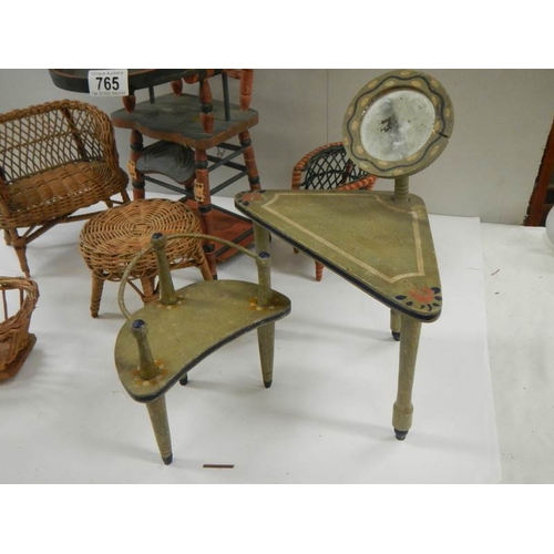 765 - A mixed lot of vintage dolls house furniture including French dressing table and stool.