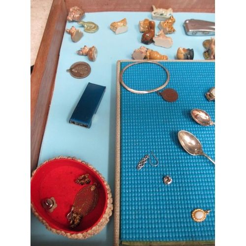 645 - A display case of miscellaneous items including watches, jewellery, Wade Whimsies etc., (this lot is... 