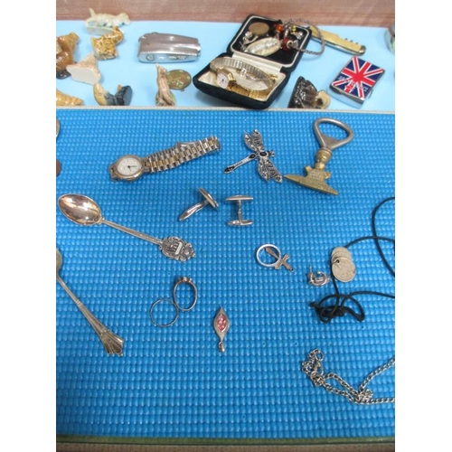 645 - A display case of miscellaneous items including watches, jewellery, Wade Whimsies etc., (this lot is... 