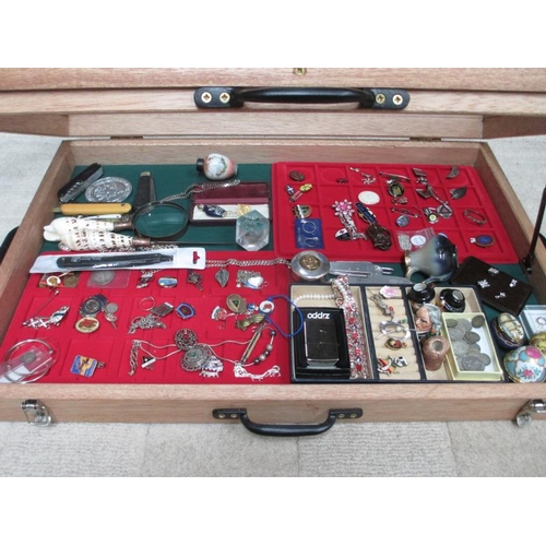 647 - A display case containing assorted jewellery, trinket boxes, badges etc., (this lot is buyer collect... 