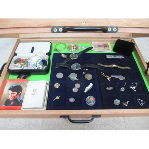 651 - A display case containing assorted watches and jewellery etc., (this lot is buyer collect only).