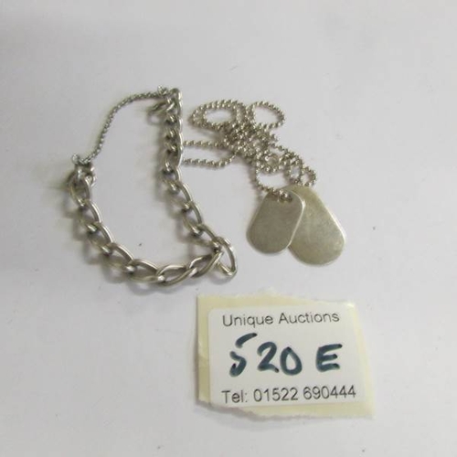 520E - A silver dog tag necklace and a silver bracelet.