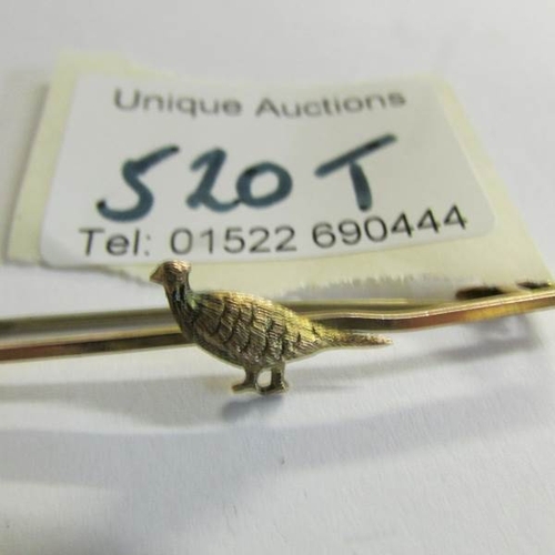 520T - A 9ct gold 9.5 gram pheasant brooch.