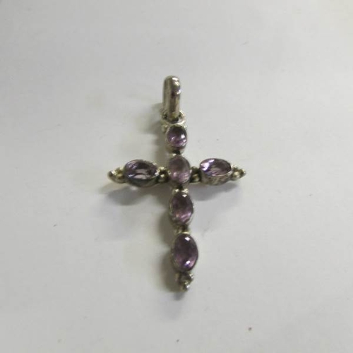 520U - A silver and amethyst cross, a Papal medallion, silver plate vesta etc.,