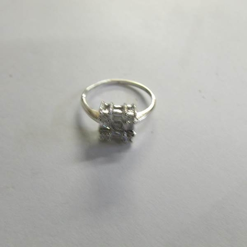 530D - An 18ct baguette and brilliant white gold ring, size I.