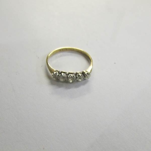 530J - An 18ct yellow gold and diamond ring, size Q.