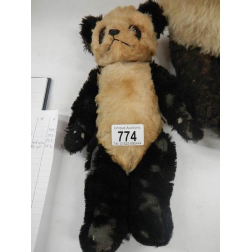 774 - A 1920's English panda and a nightdress case, well worn.