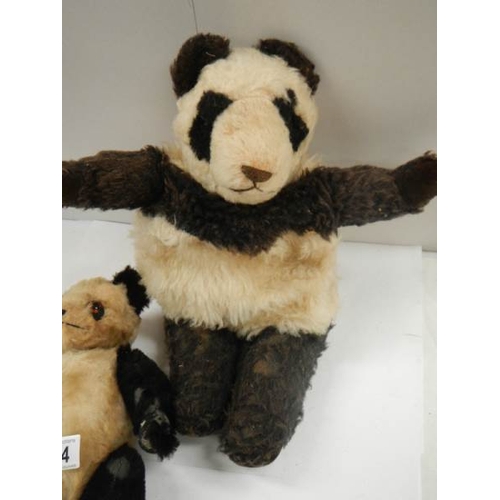 774 - A 1920's English panda and a nightdress case, well worn.