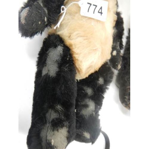 774 - A 1920's English panda and a nightdress case, well worn.