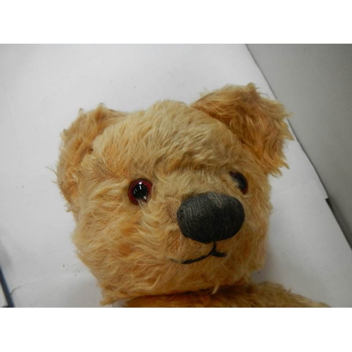 783 - An old Chad Valley Teddy bear, in fair condition apart from pads.