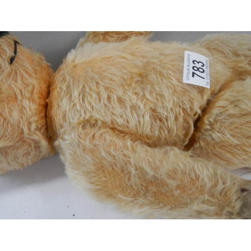 783 - An old Chad Valley Teddy bear, in fair condition apart from pads.