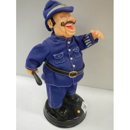 786 - A battery operate laughing policeman, in working order.