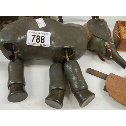 788 - 7 assorted wooden items. some in need of repair and larger elephant has leg missing.