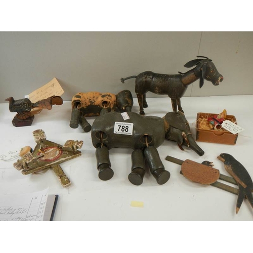 788 - 7 assorted wooden items. some in need of repair and larger elephant has leg missing.