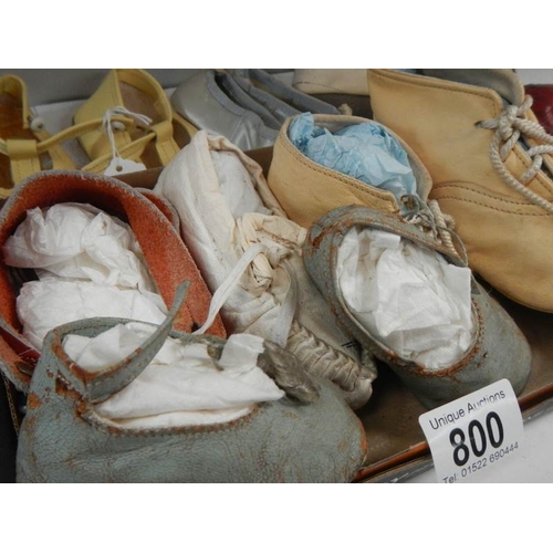 800 - A quantity of vintage dolls shoes.