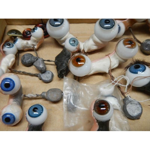 804 - A quantity of Victorian glass dolls eyes.