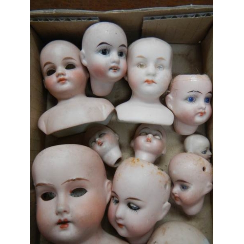 809 - 10 Victorian porcelain dolls heads including French and German (see images).