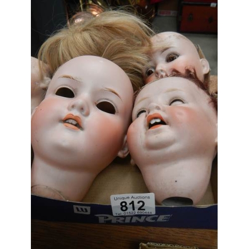 812 - 4 large Victorian dolls heads.