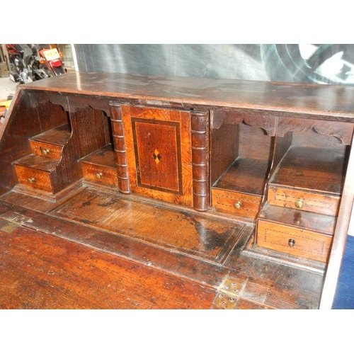 834 - A Georgian mahogany bureau.