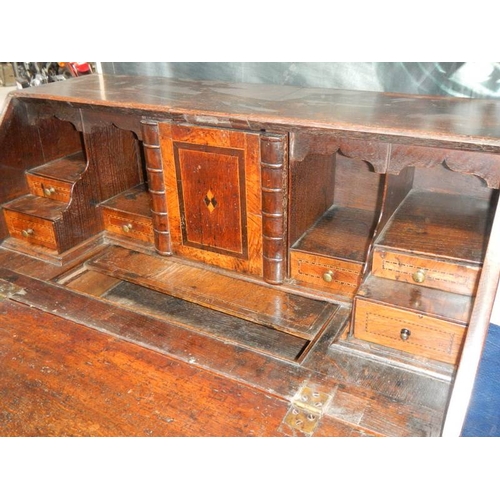 834 - A Georgian mahogany bureau.