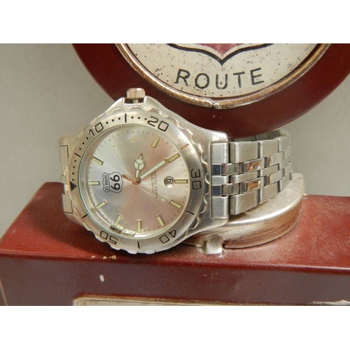 672 - A Historic West Route 66 clock in the shape of a petrol pump together with a Route 66 wrist watch (c... 