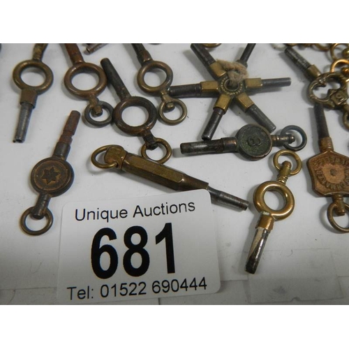 681 - A large lot of late 19th / early 20th century pocket watch keys (approximately 37).