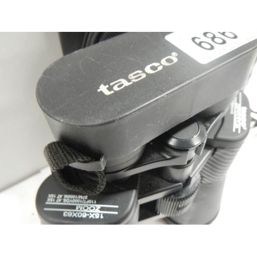 686 - A good pair of Tasco 15 x 60 x 63 zoom binoculars.