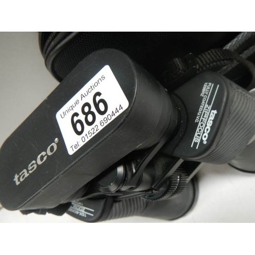 686 - A good pair of Tasco 15 x 60 x 63 zoom binoculars.