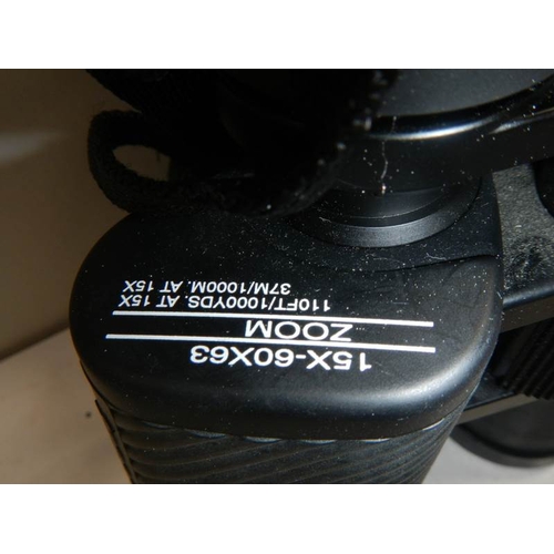 686 - A good pair of Tasco 15 x 60 x 63 zoom binoculars.