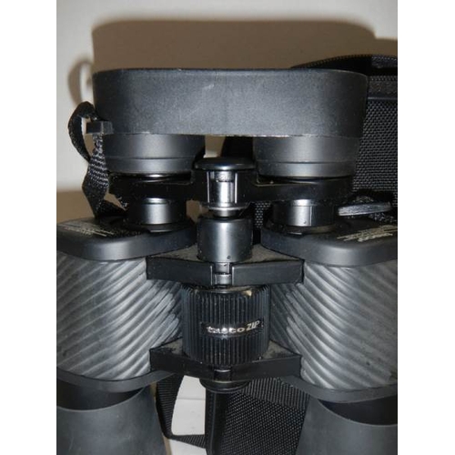 686 - A good pair of Tasco 15 x 60 x 63 zoom binoculars.