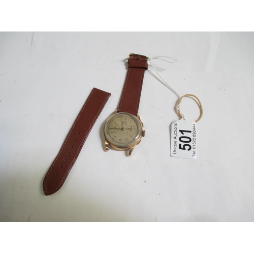 501 - A fine Dogma Prima wrist watch with 18ct gold back and calf strap, in full working order.